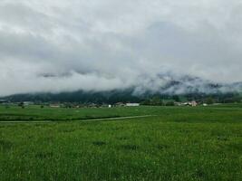 Cloud-covered mountains in Bavaria Germany photo