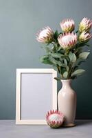 Empty white frame mockup with Scandinavian look, protea flowers in vase, photo