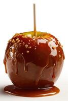 Delicious caramel apple wooden stick on plate. photo