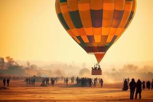 Hot Air Balloon on the ground landing or starting to launch with unrecognizable people, photo