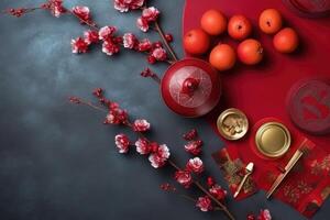 Chinese New Year festival decorations, mandarins, flowers, envelopes . Flat lay, top view. photo