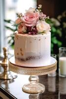 Beautiful designer wedding cake with floral decorations, photo