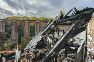 Old abandoned building, and the roof destroyed by fire, somewhere in Belgium. photo