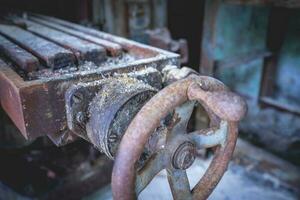 Old rusty machines in an abandoned factory. photo