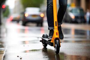 Close up of unrecognizable woman riding a scooter at the city street, photo