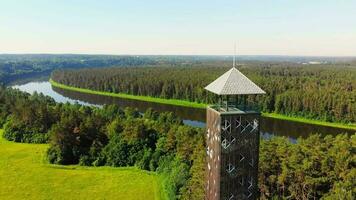 Cinematic panning aerial panoramic view famous observation viewpoint tower in Birstonas in Lithuania video