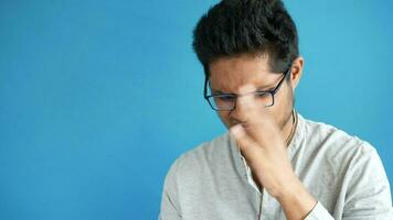 Man bothered by bad smell and covering his nose video