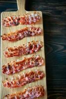 Fried bacon strips photo