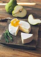 Camembert cheese with pears photo