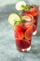 Two glasses with Spanish fruit Sangria photo