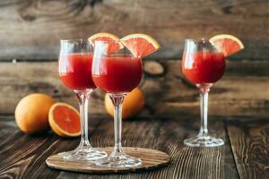 Three glasses of Mimosa cocktail photo