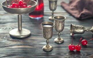 Cherry liqueur with cocktail cherries photo