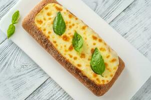 Ciabatta stuffed with cheese photo