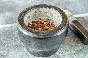 Grinding of peppercorn mix photo