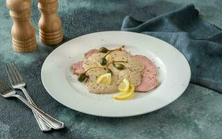 Vitello tonnato - cold, sliced veal photo