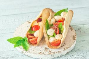 Caprese tacos closeup photo