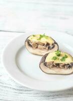 Baked mushroom stuffed with mozzarella photo