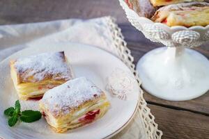 Mille-feuille with fresh cherry photo