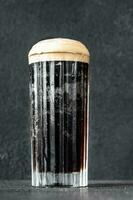 Glass of black velvet cocktail photo