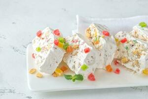 White nougat with fresh mint leaves photo