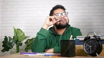 Lazy young student sleeping on table video