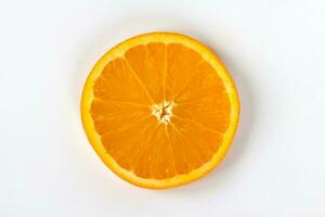 Cut orange on a white background. Natural orange fruit with cut slices. Vitamin C. photo