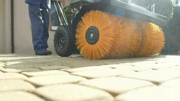 Residential Brick Driveway Cleaning Using Gasoline Power Brush Equipment. video