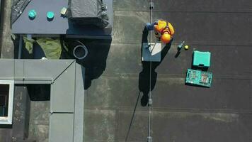 Aerial View of Technician Adjusting Metal Rod of Lightning Protection video