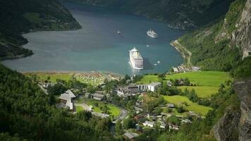 Norwegian Top Destination. Village of Geiranger and the Geirangerfjor During Sunny Summer Day. video