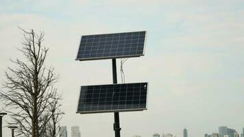 Solar panels against blue sky . video