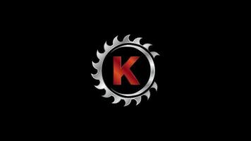 English alphabet K with the saw blade. Carpentry, woodworking logo video animation. Logo footage for sawmill business and company identity