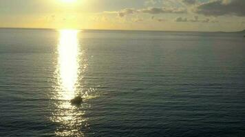 Aerial view of the Atlantic Ocean on the background of a beautiful sunset video