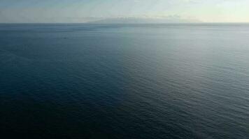 Aerial view of the Atlantic Ocean on the background of a beautiful sunset video