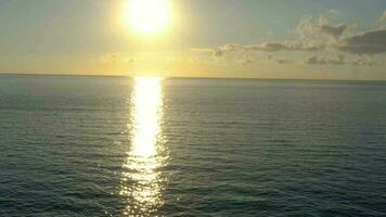 Aerial view of the Atlantic Ocean on the background of a beautiful sunset video