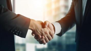 Two Businessman shaking hands in office. Close-up of handshake, photo