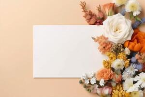 flat card with white space and colored flowers on a light wall photo