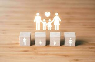 Wooden blocks of family icon. family life concept. photo