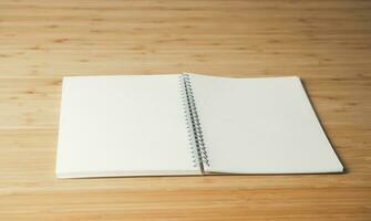 Notebook place on the wooden table. Education, Learning and Idea concept photo