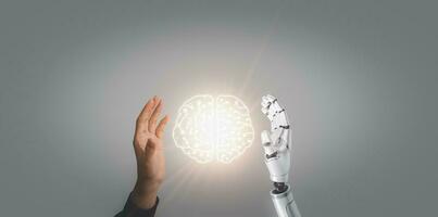 Business man and robot hand touch digital screen of AI icon artificial intelligence concept, big data, science, innovation technology, cloud computing, futuristic, internet network communication photo
