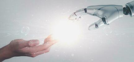 Robot hand touch businessman hand, artificial intelligence concept. big data, science, innovation technology, cloud computing, futuristic, internet network communication photo