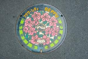 Beppu,Oita,Kyushu,Japan - October 15, 2018  Manhole Cover of Beppu city,Oita,Kyushu,Japan photo