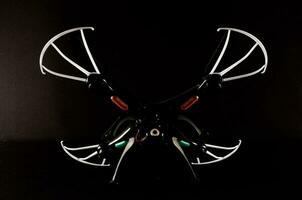 Drone on black background photo