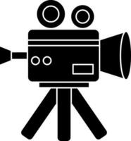 Isolated camera icon in glyph style. vector