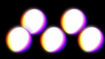 Abstract 3d background with beautiful rainbow colors gradient on wax bubbles metaball. Spheres fly in the air with an inner glow, 3d ball appears by illuminating with colorful neon light. video