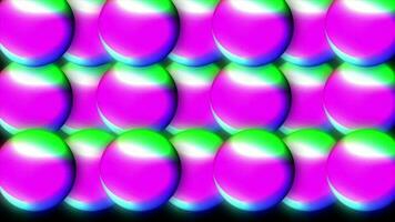 Abstract 3d background with beautiful rainbow colors gradient on wax bubbles metaball. Spheres fly in the air with an inner glow, 3d ball appears by illuminating with colorful neon light. video