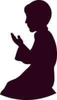 Silhouette of a praying muslim boy. vector