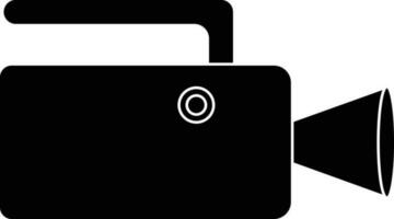 Black video camera in flat style. vector