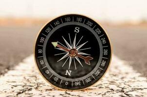 Compass  on the road photo
