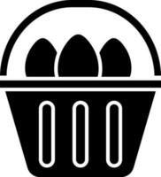 Black eggs in basket flat icon. vector