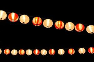 bright light Japanese lamp in the festival at night time with dark sky background photo